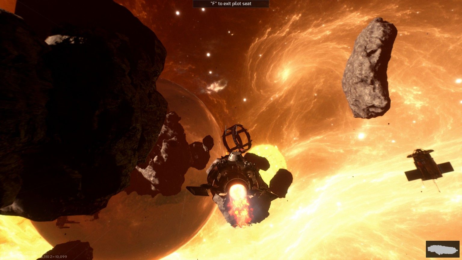 Screenshot of the game. Ships fly through an asteroid field bathed in orange light.