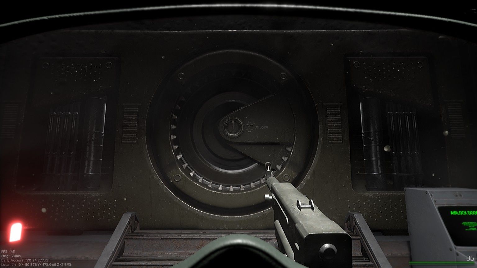 Screenshot of the game. A first-person perspective holding a gun, facing a round spaceship door.