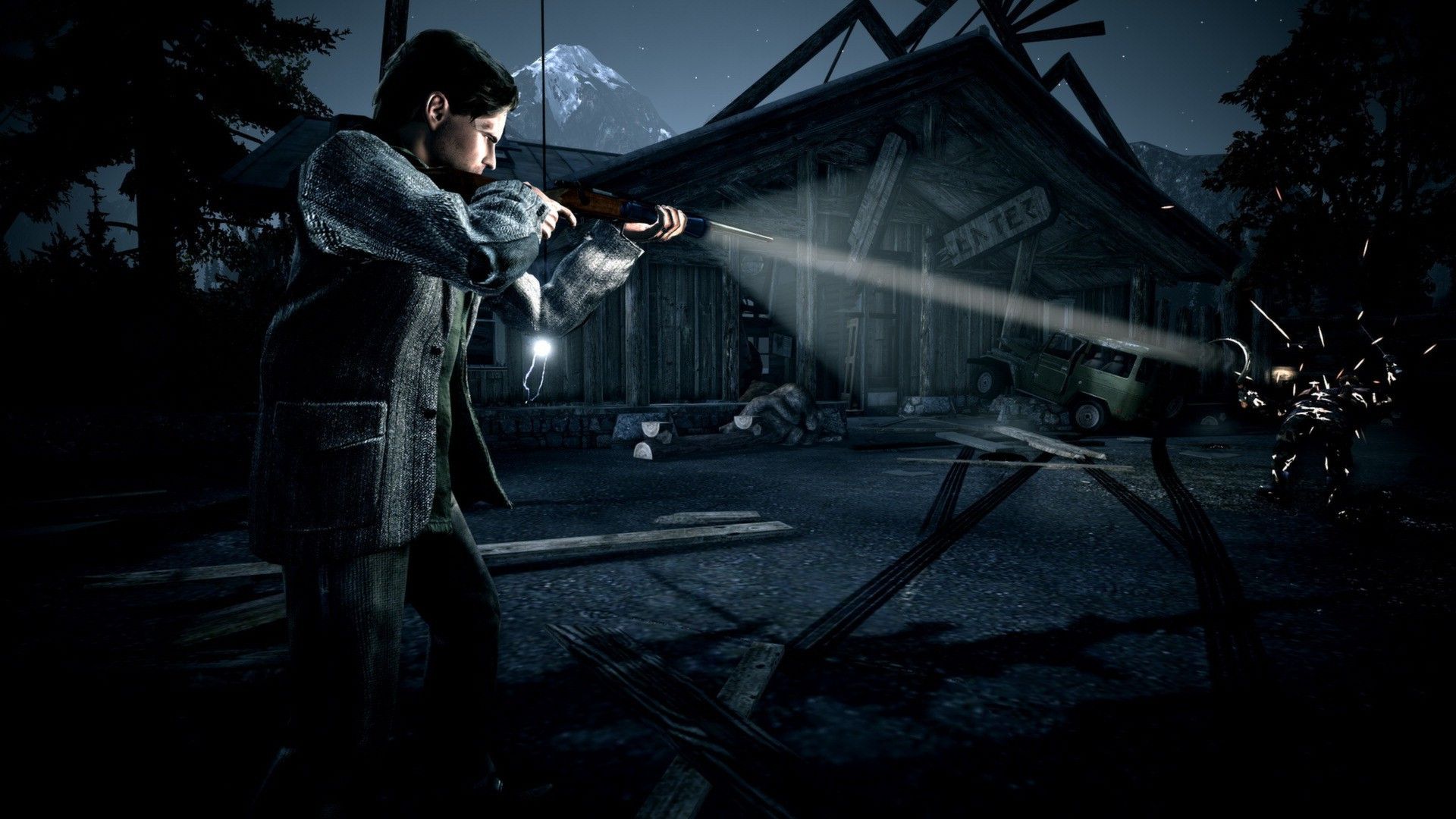 Alan Wake aiming his rifle and torch at the dead of night.