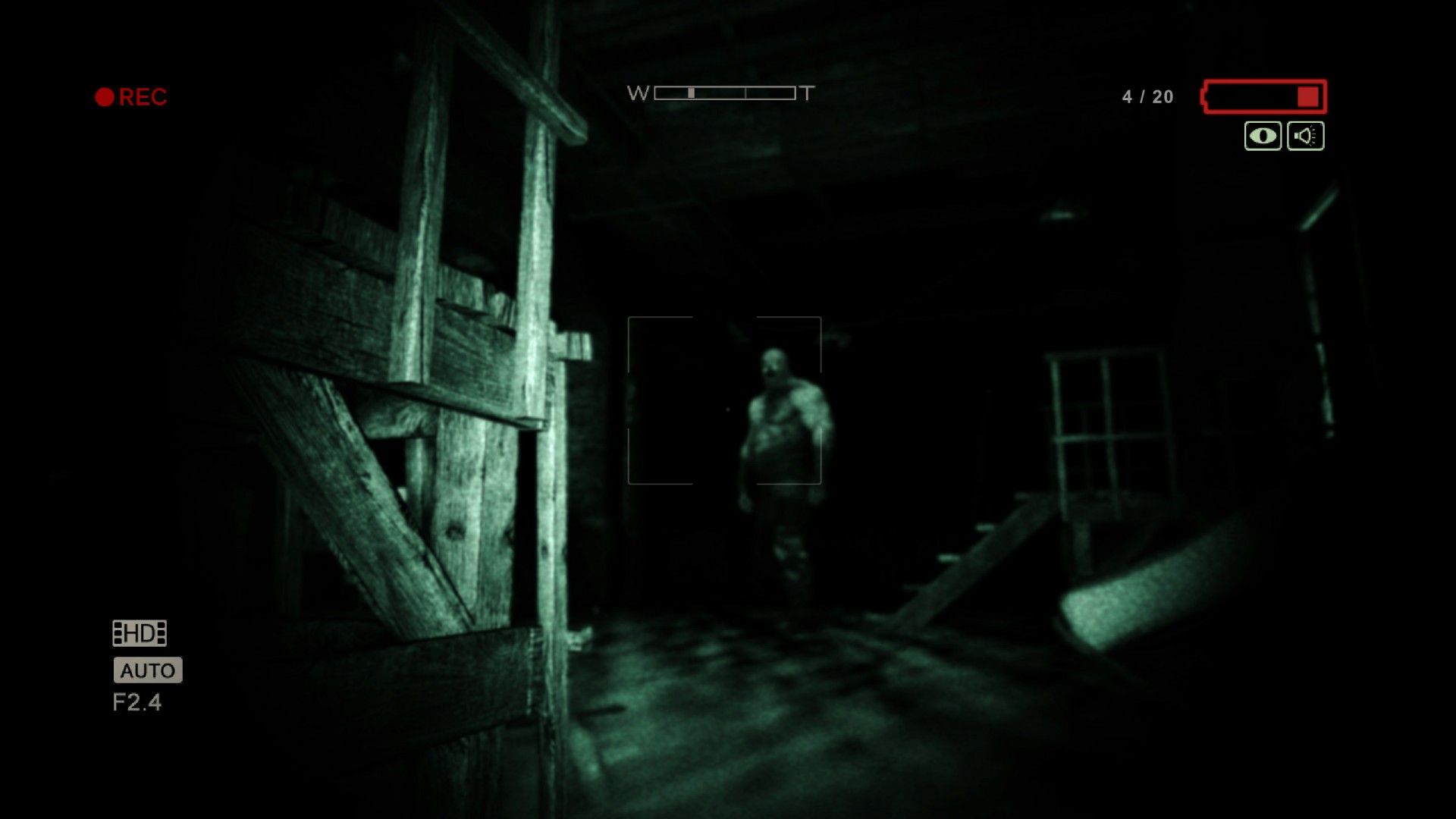 Outlast Night-vision camera revealing a hulking abomination lurking in the dark.