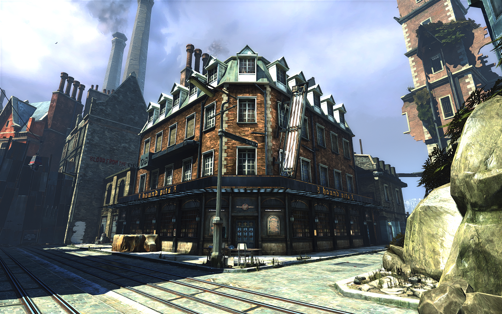 Screenshot from the game. Street corner depicting a red brick building with tall industrial chimneys behind it.