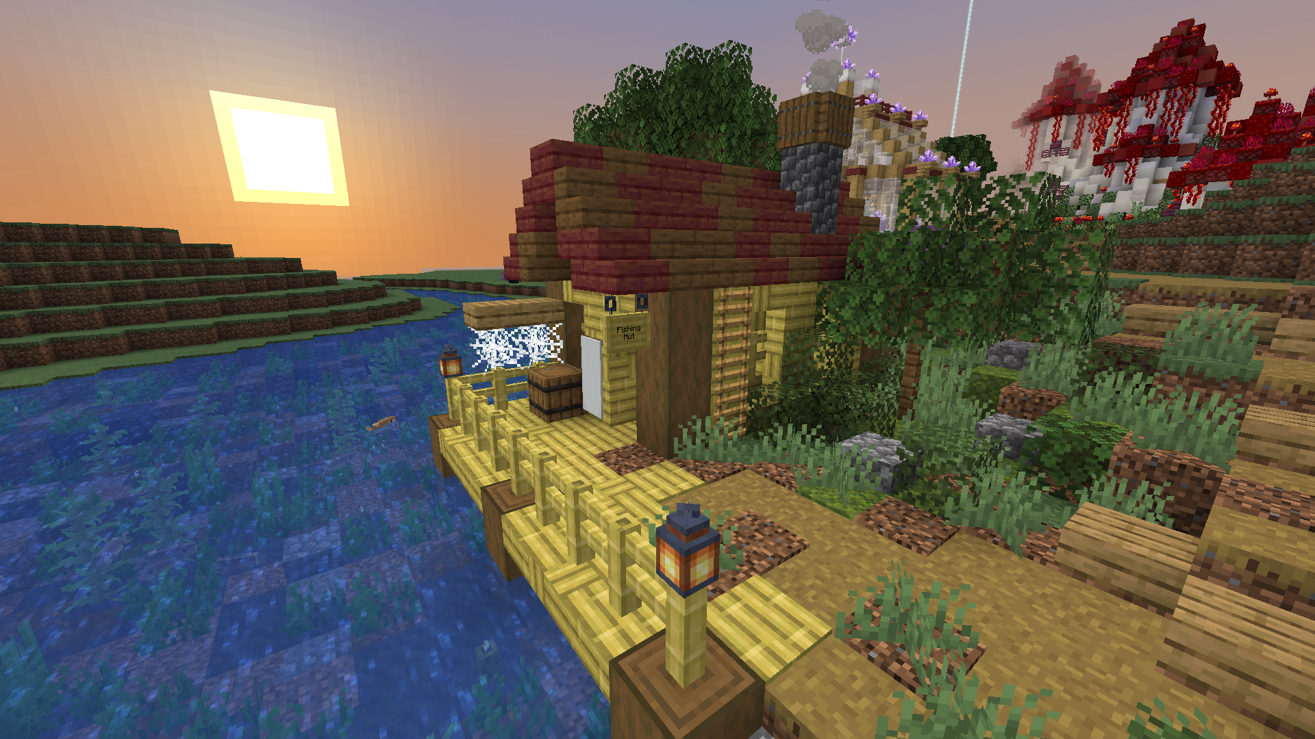 A screenshot of a small bamboo fishing hut with a dock in front of it and a lake with a sunset in the background.