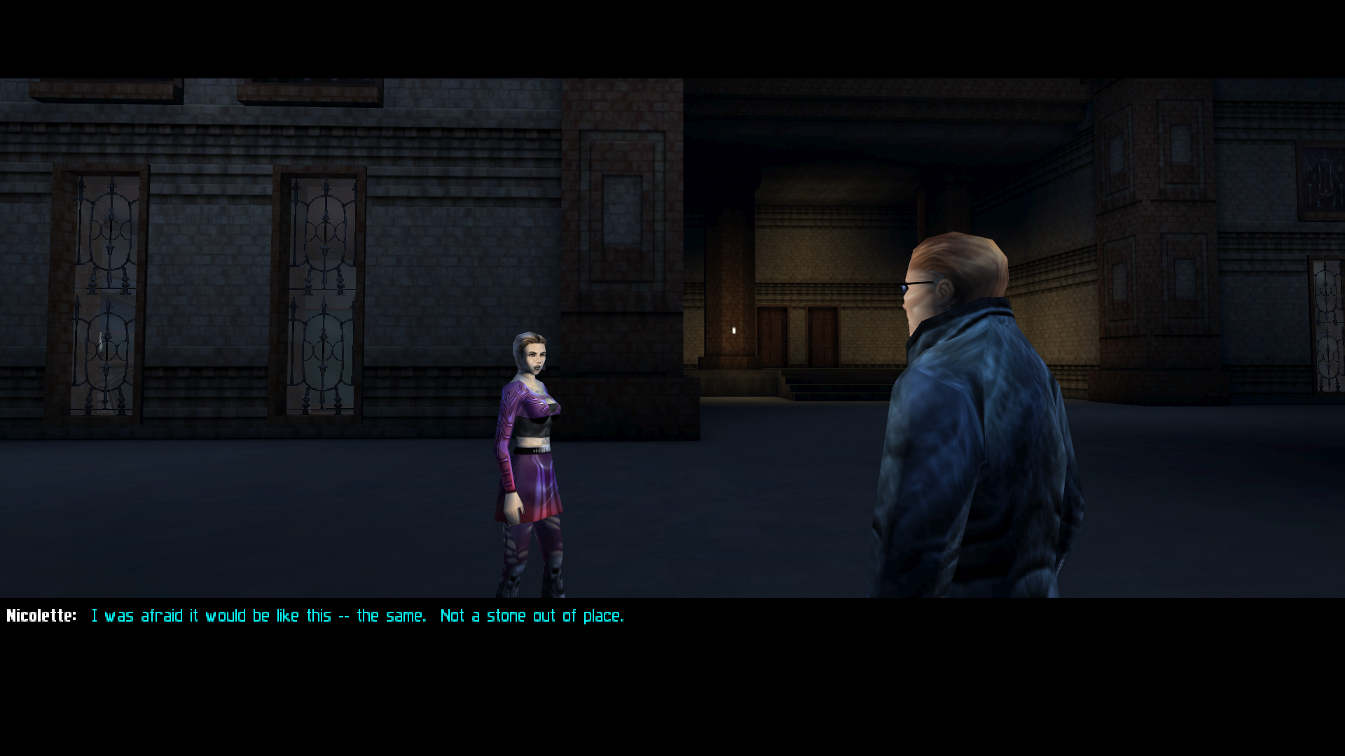 Screenshot of the game. A woman in purple chats with a man in a blue coat as they stand in the street.
