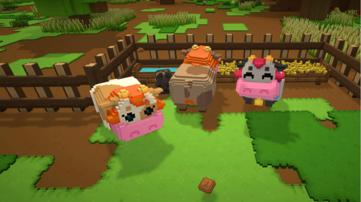 Screenshot from Staxel. Three little pixelated cows stand in a small fenced-off area of a grassy farm.