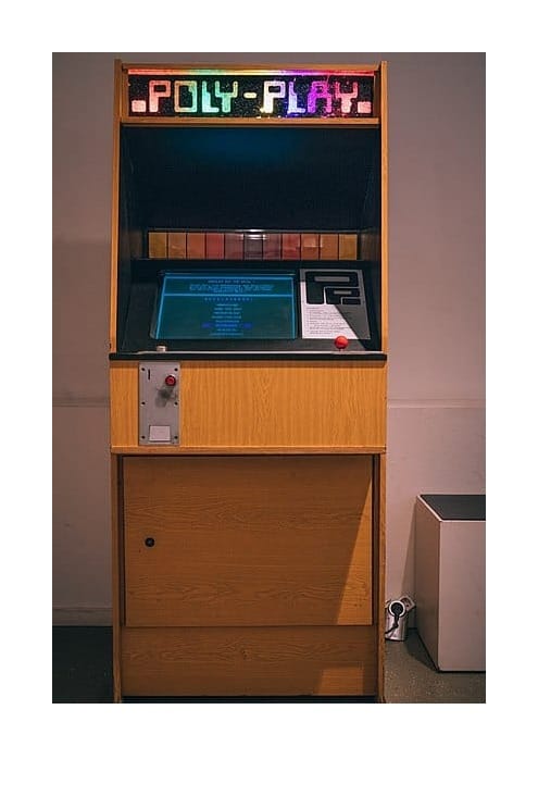 An arcade cabinet labeled Poly-Play, circa 1980s.