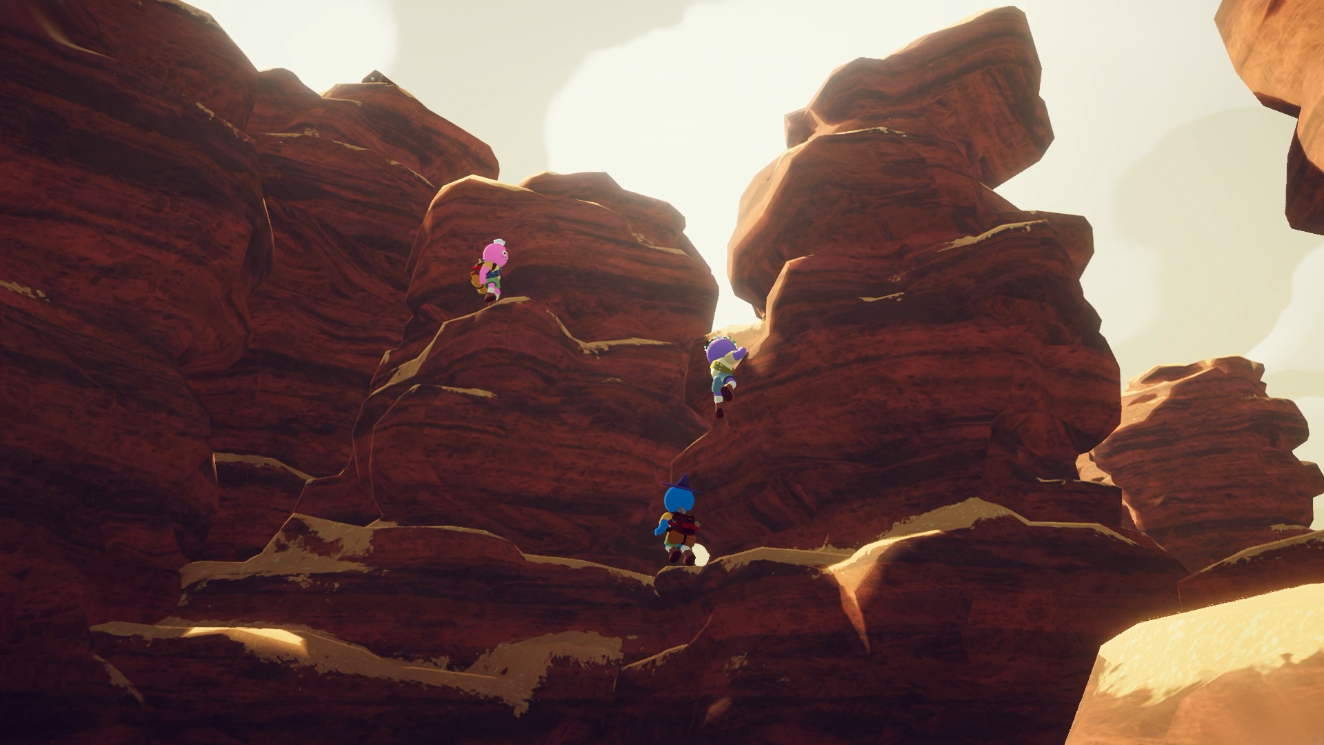 Three climbers (pink, purple, and blue) ascend red desert rocks.