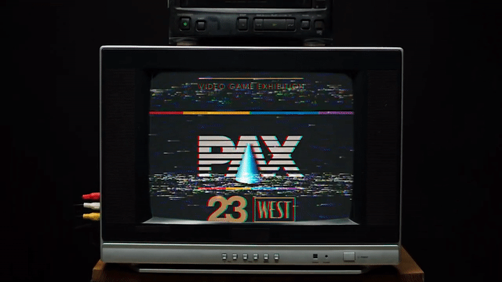 A gif of a retro television with a logo for PAX West 2023 styled like a classic VHS logo glitching into place.